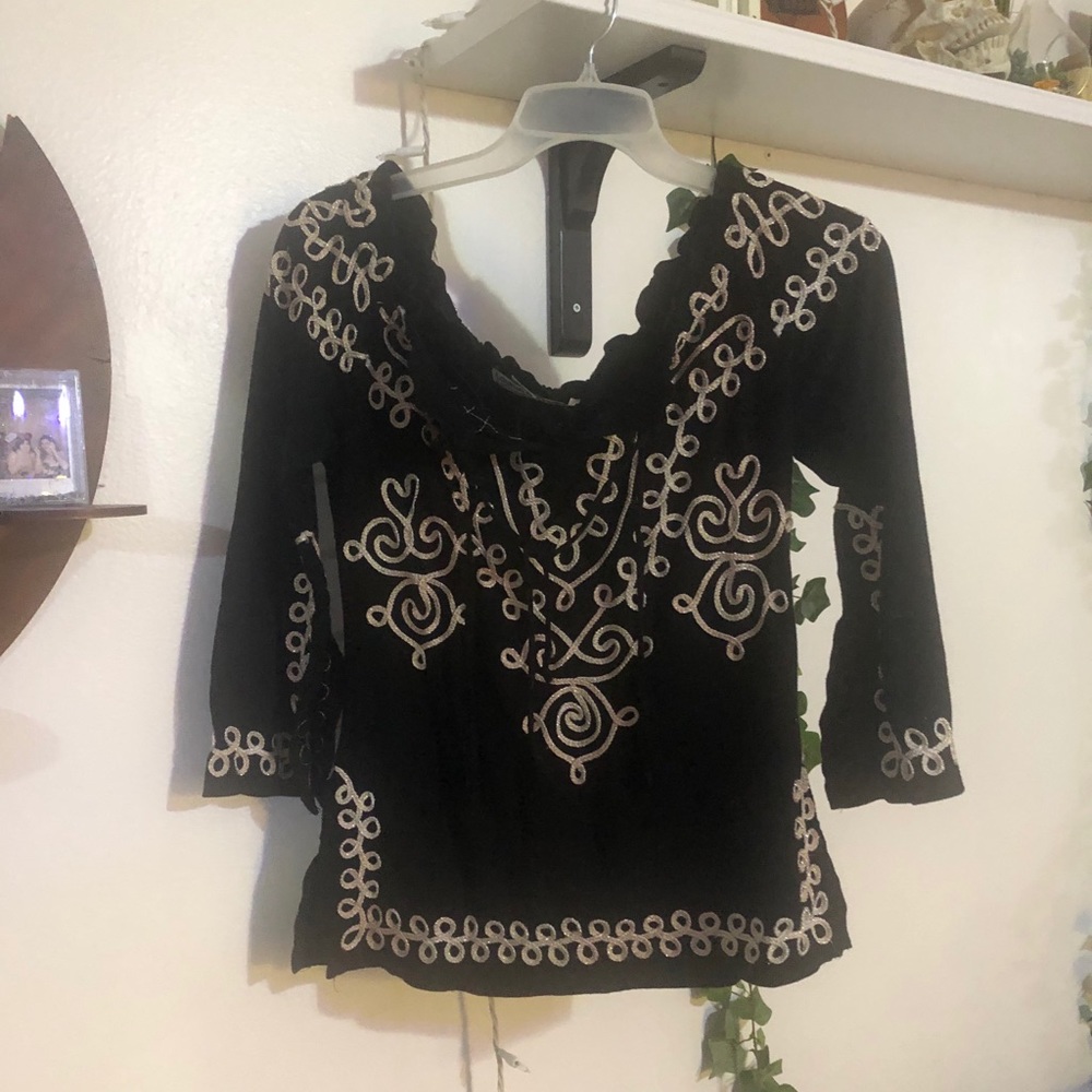 Black shirt with gold detailing